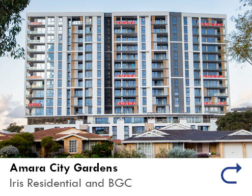 link to the Amara City Gardens project feature by the Australian National Construction Review. Image shows the large facade of the Amara City Gardens project, with a clear blue sky reflected in its windows, and yellow, grey and white cladding panels breaking the lines of windows.