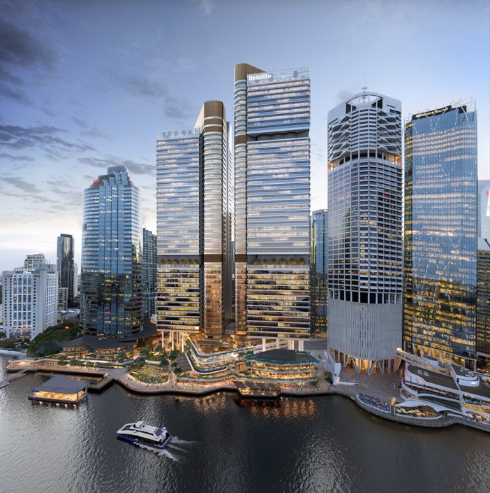 Drone shot of high rise office towers along Brisbane Waterfront, with lights on.
